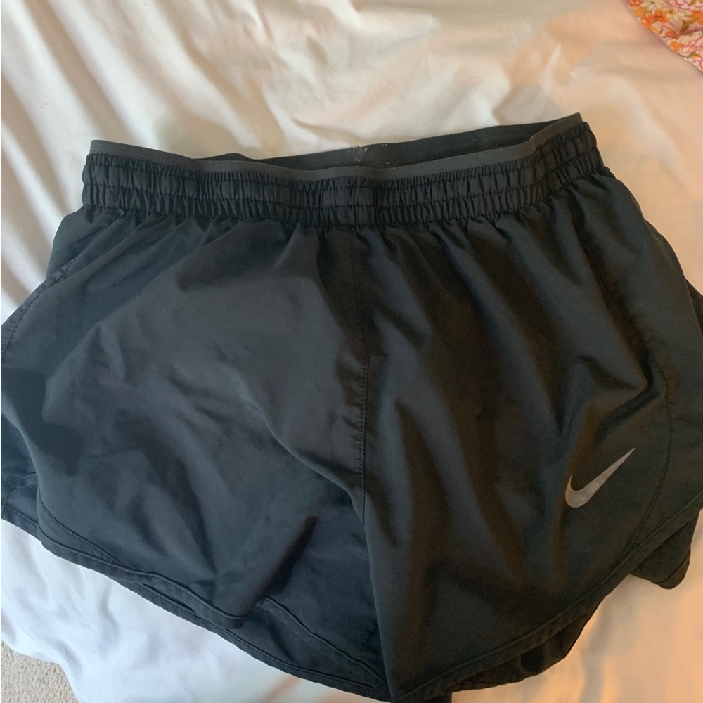 Black Nike running shorts